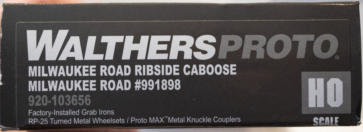 Walthers Proto HO #920-103656 Milwaukee Road Rib Sided Caboose -- Milwaukee Road