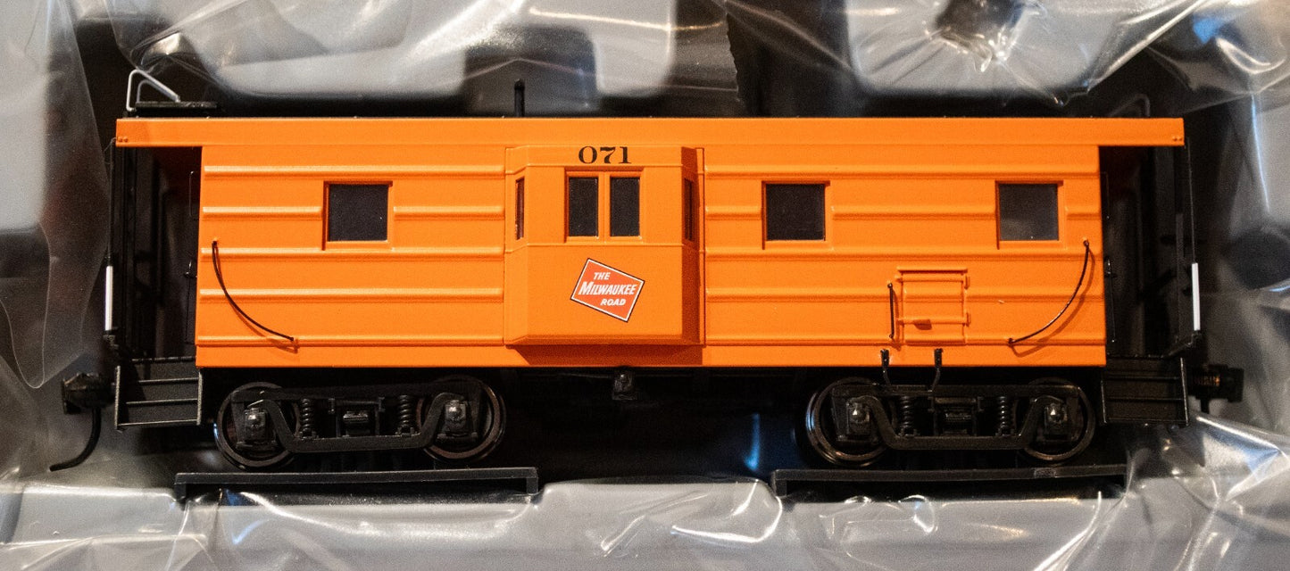 Walthers Proto HO #920-103658 Milwaukee Road Rib Sided Caboose -- Milwaukee Road
